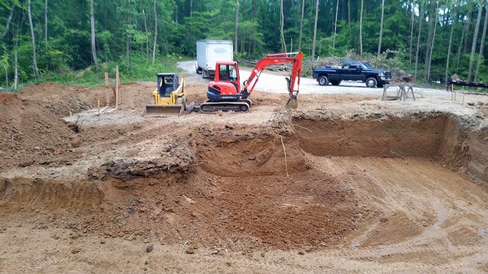 Romine Excavating & Septic Vehicle Fleet at a Job Site