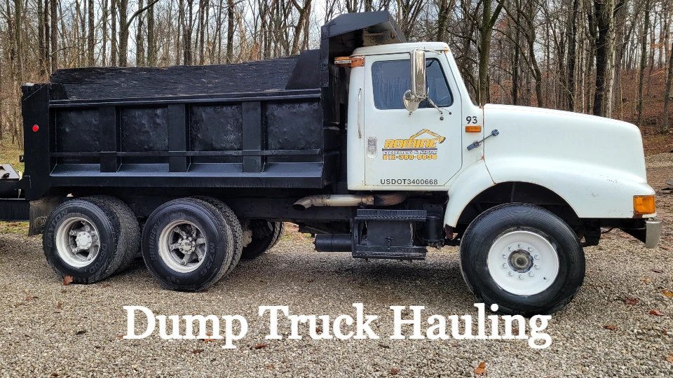 Need a load of sand, gravel, topsoil, mulch, or other material delivered to or from your location? Romine Excavating & Septic based out of Hope, Indiana is ready for anything with our Single and Tandem Axle Dump Trucks!